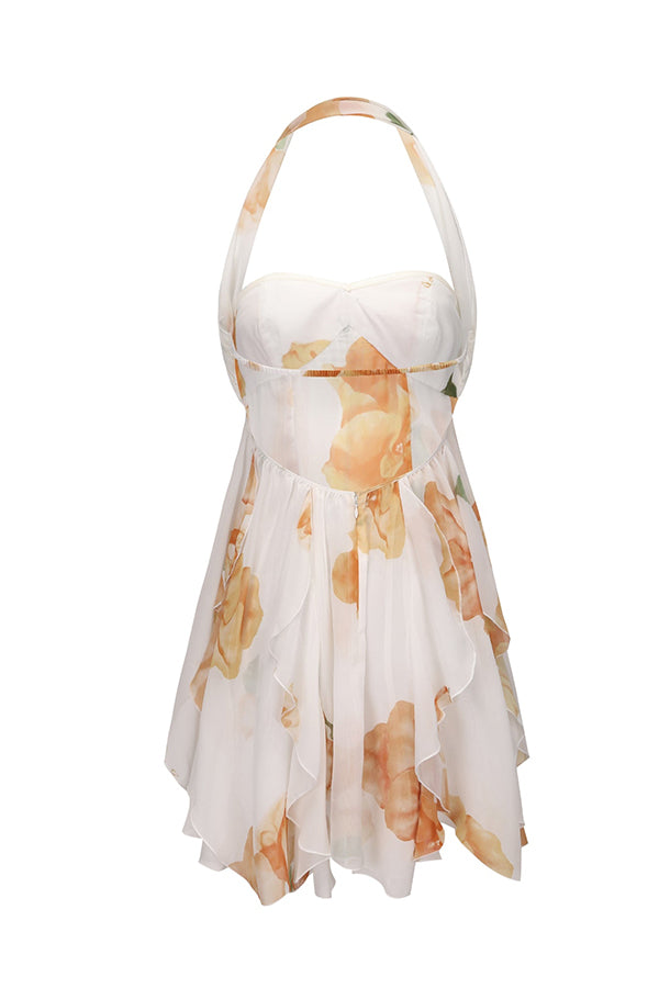 Vestido corto Arabella con volantes, abertura y cuello halter invertido, estampado floral y broche de estrellas de mar