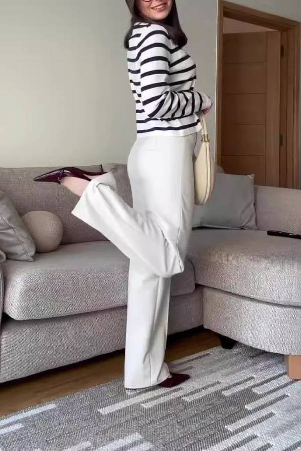 Cárdigan de punto a rayas con botones metálicos