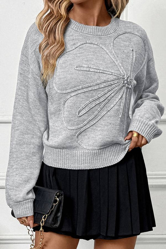 Suéter de punto suelto con cuello redondo y flores 3D 