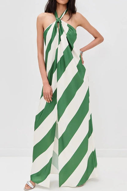 Vestido largo holgado con cuello halter, espalda descubierta, bolsillos y estampado de rayas de ensueño 