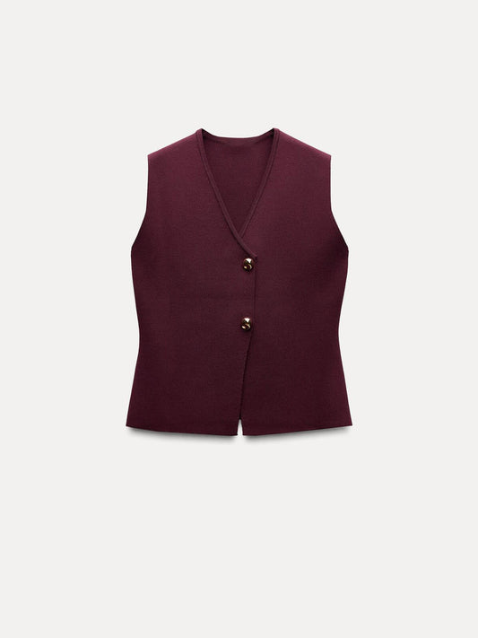 Knitted Vest And Pleated Skirt