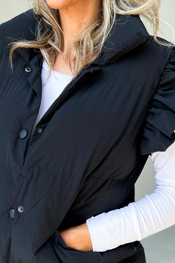 Chaleco con bolsillos y solapa abotonada y mangas con volantes de Remi 