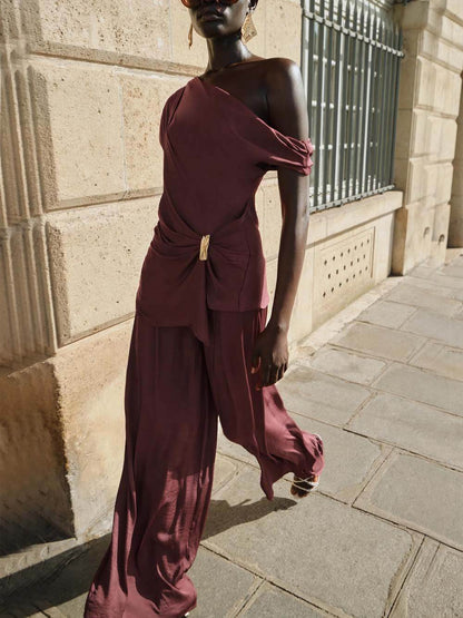 Unique Asymmetric Hem Metallic Accents Top