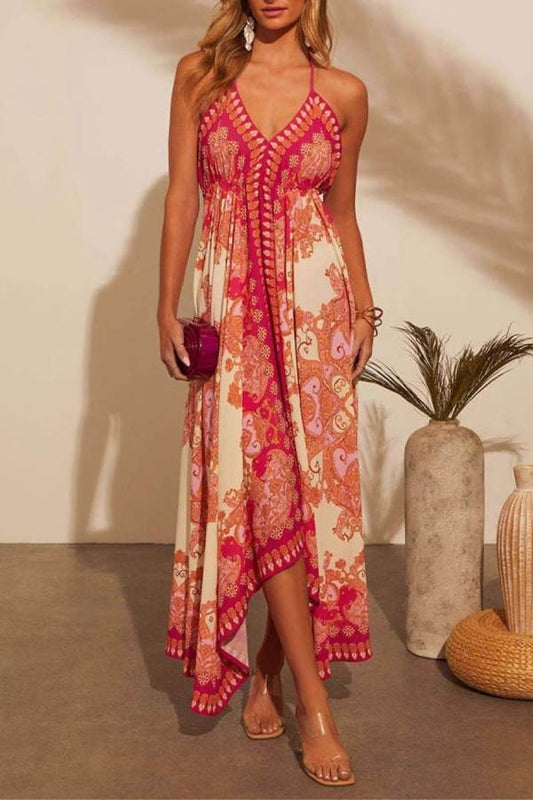 Elegante vestido con vuelo, escote en V y tirantes con estampado