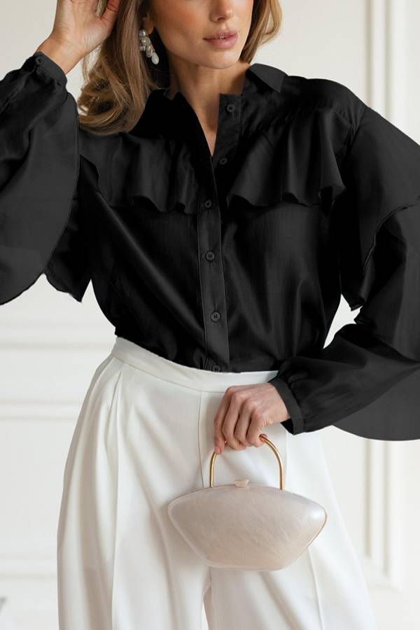 Blusa transparente con volantes 