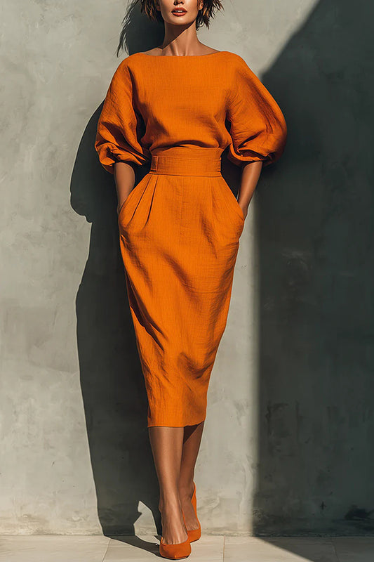 Elegante vestido midi informal con bolsillos, cintura alta y mangas abullonadas 