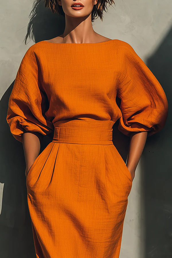 Elegante vestido midi informal con bolsillos, cintura alta y mangas abullonadas 