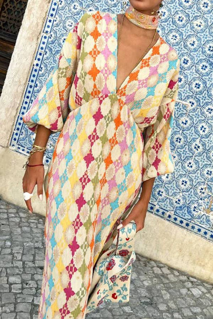 Elegante vestido estampado con cuello en V y mangas farol