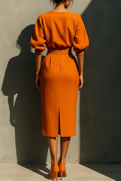 Elegante vestido midi informal con bolsillos, cintura alta y mangas abullonadas 