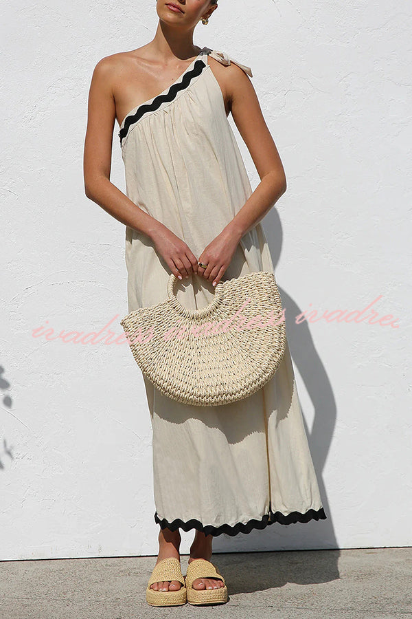 Vestido largo de lino con un hombro al descubierto y lazo para resort 