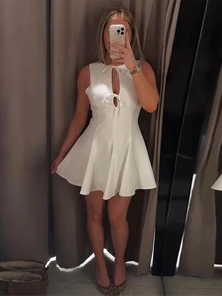 Hollow Out Bow Solid Sleeveless Pleated Dress