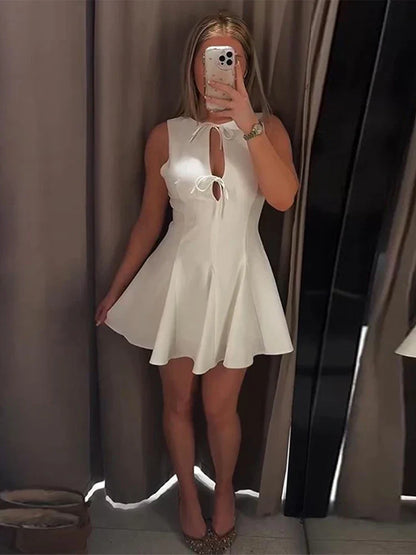 Hollow Out Bow Solid Sleeveless Pleated Dress