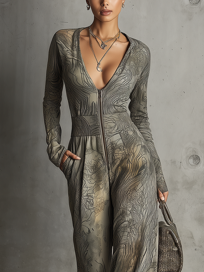 Fluid Printed Jumpsuit With Deep V Neckline And Wide-Leg Silhouette