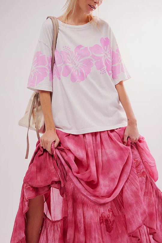 Camiseta holgada de manga corta con cuello redondo y estampado floral 