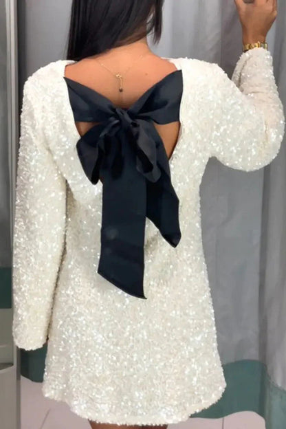Vestido mini holgado con lazo en la espalda y lentejuelas para bailar toda la noche 
