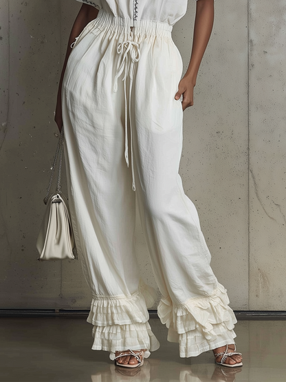 Embroidered Cotton Jumpsuit With Drawstring Waist And Ruffled Hem