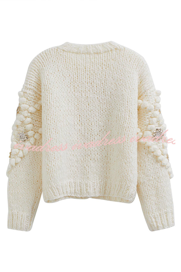 Cárdigan de punto con lentejuelas y pompones de flores 
