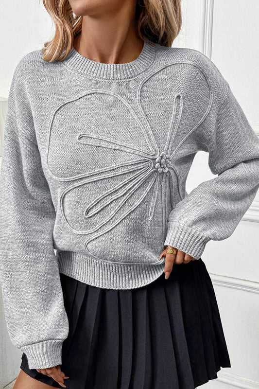 Suéter de punto suelto con cuello redondo y flores 3D 